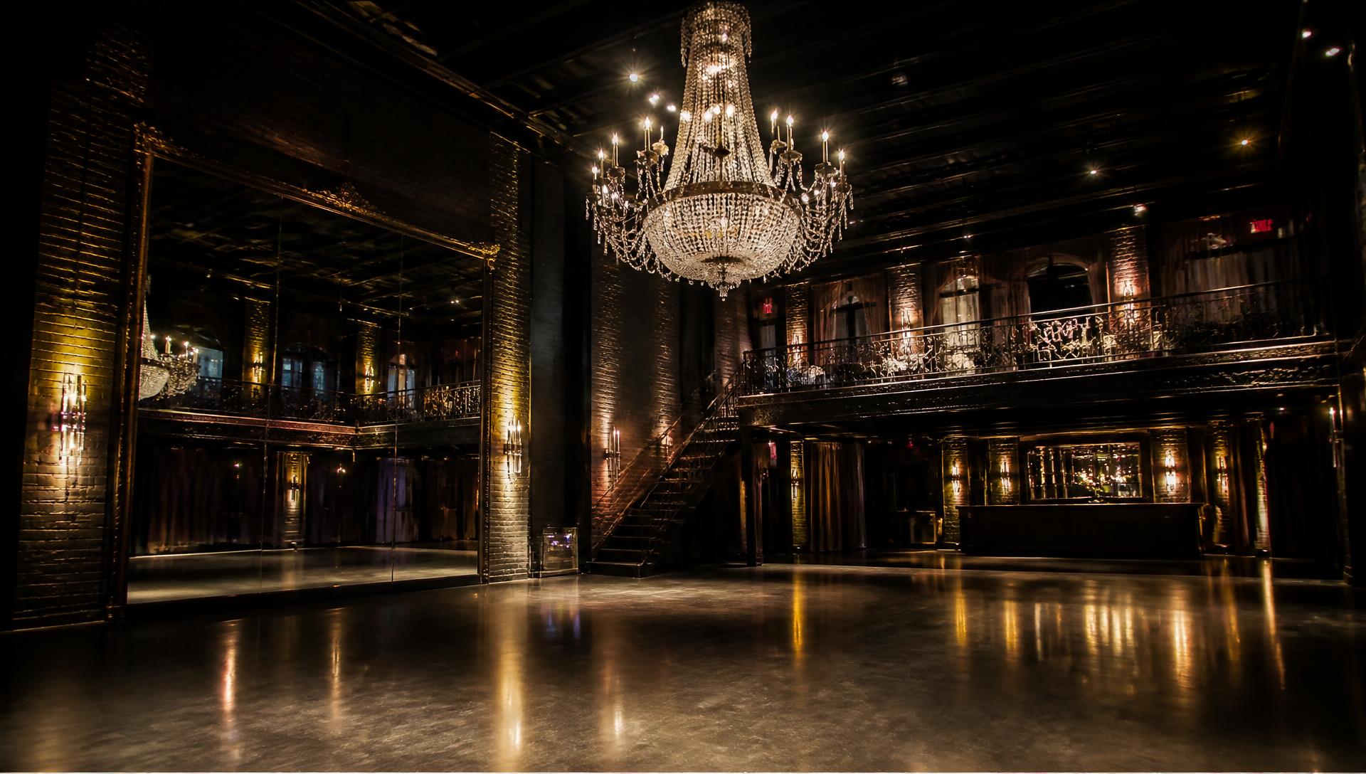 Detroit Circle Center main hall with chandelier and mirrored wall